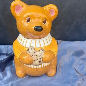 Vintage cookie jar.  Bear yellow eating cookie.